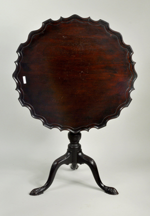 George III mahogany piecrust table. Woodbury Auction image.
